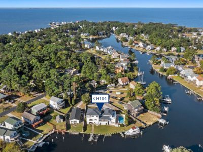 Dock For Rent At Beautiful OBX Home with 150′ Bulkhead – 3 Boat Slips/1 Lift Available